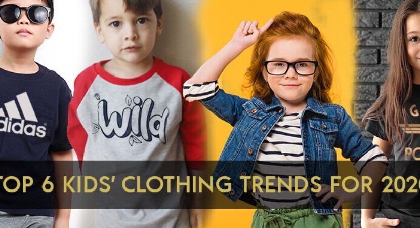 Quatre enfants en vêtements de marque tendances.